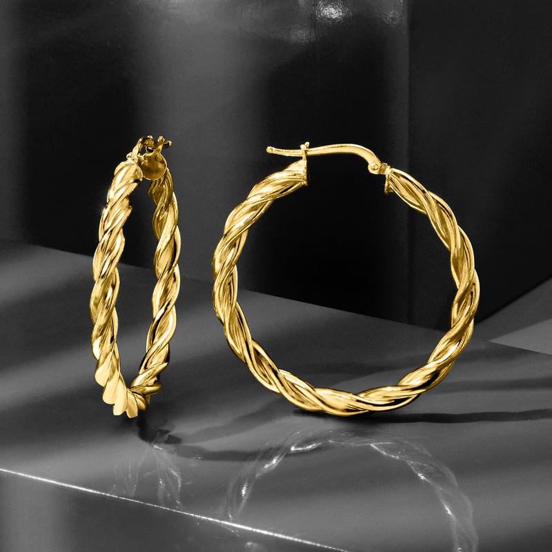 Twisted rope gold hoop earrings, rounded profile with hinged closure