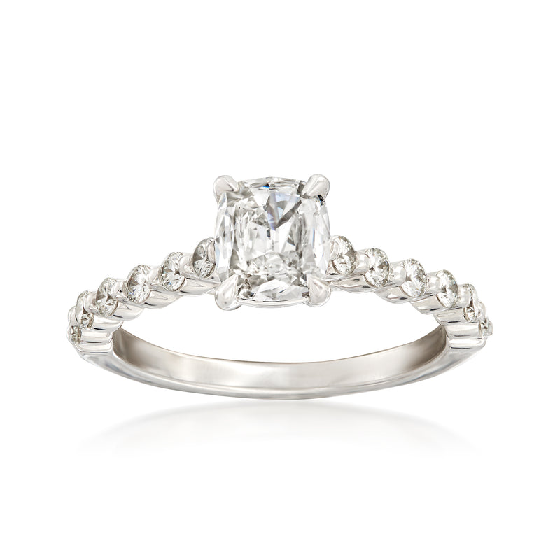 18kt white gold engagement ring with square-cut center diamond and round side stones