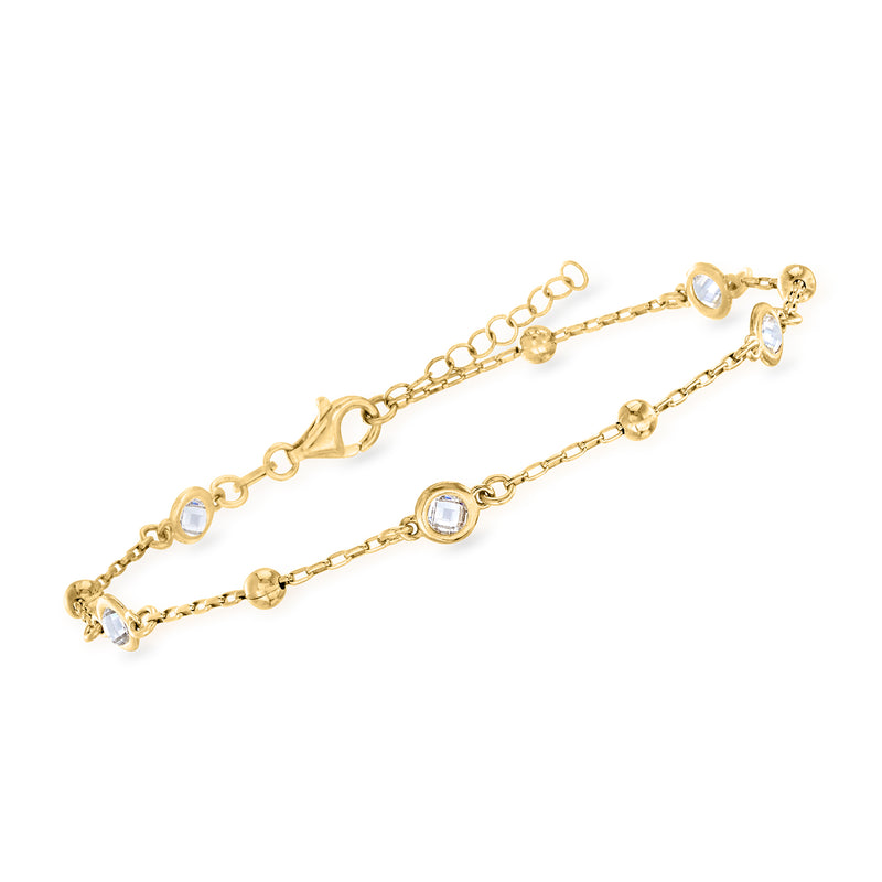 Gold-tone CZ station anklet with round bezel-set stones and lobster clasp detail