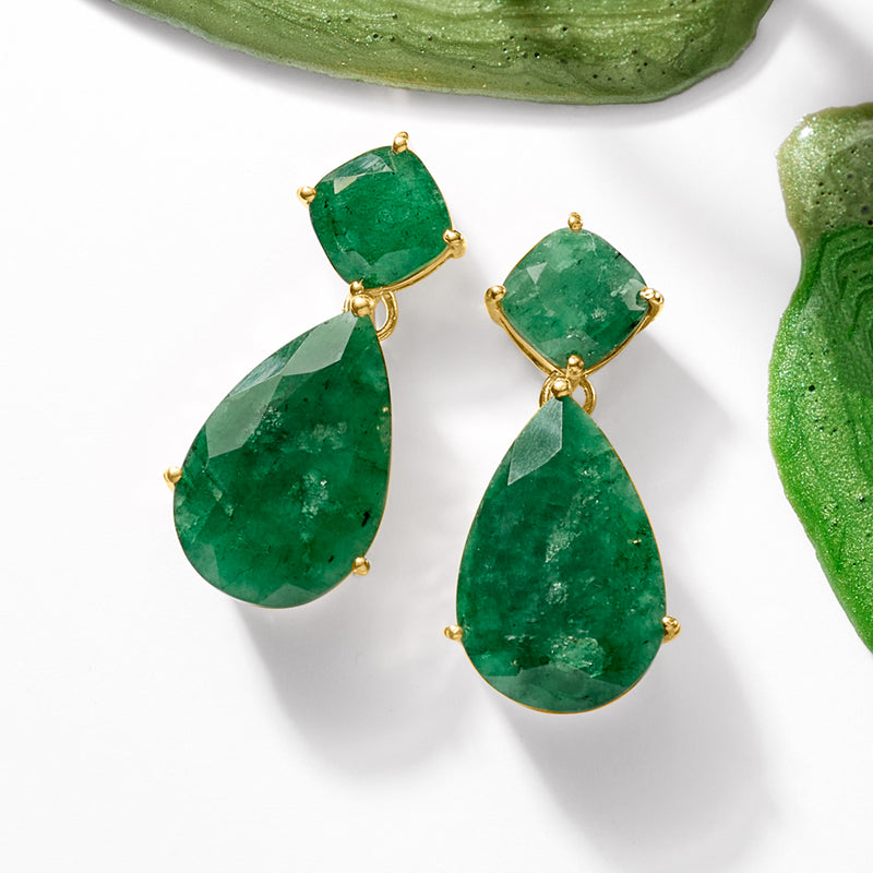 Emerald drop earrings, angled view, emerald-green stones with gold-tone settings