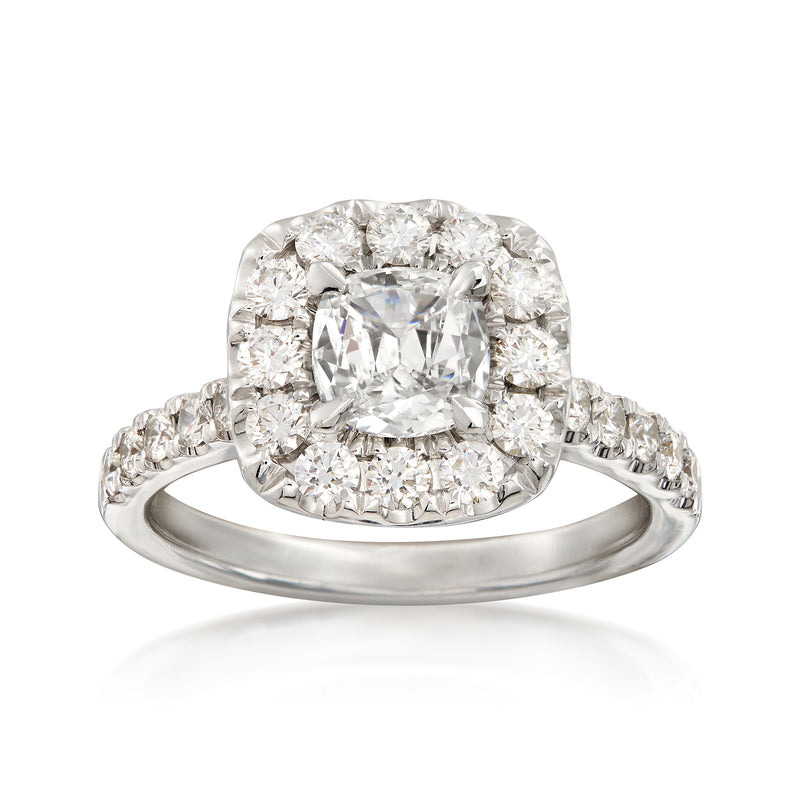 18kt white gold diamond halo ring with cushion center and round halo stones
