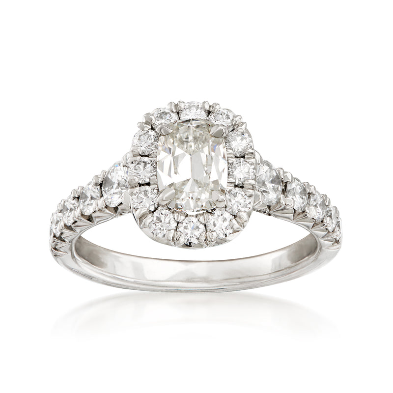 Henri Daussi platinum diamond halo engagement ring with elongated center diamond