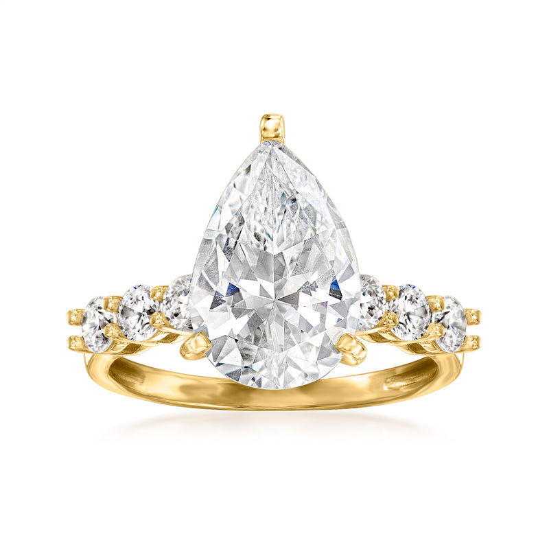14kt yellow gold CZ ring with pear-shaped clear center stone and round side stones