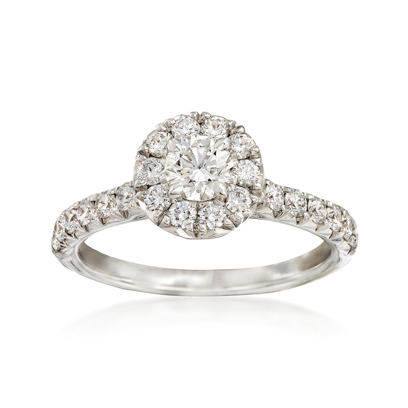 Henri Daussi diamond halo engagement ring in white gold with pavé diamond band