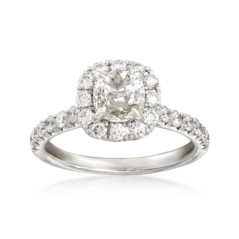 18kt white gold diamond engagement ring with center cushion-cut stone and halo