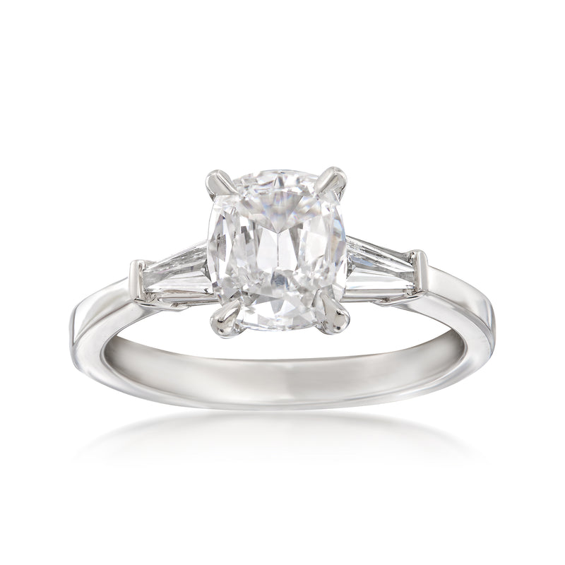 18kt white gold diamond engagement ring with oval center stone and baguette sides