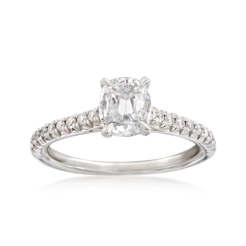 18kt white gold diamond engagement ring with square-cut center stone and pave band