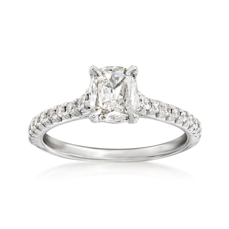 18kt white gold diamond ring with large emerald-cut center and small side stones