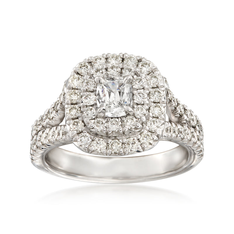 Diamond double halo engagement ring in 18kt white gold with oval center stone