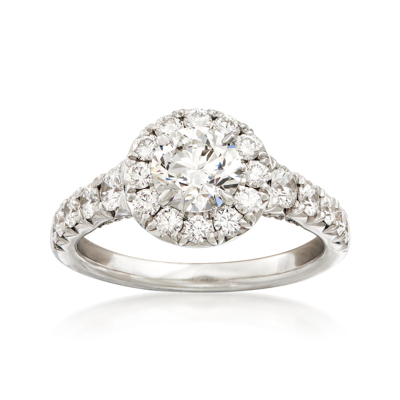 18kt white gold diamond halo engagement ring with round center stone