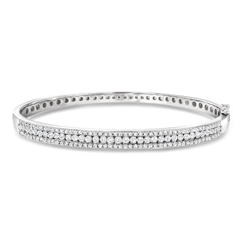 Sterling silver diamond bangle bracelet with three rows of round stones
