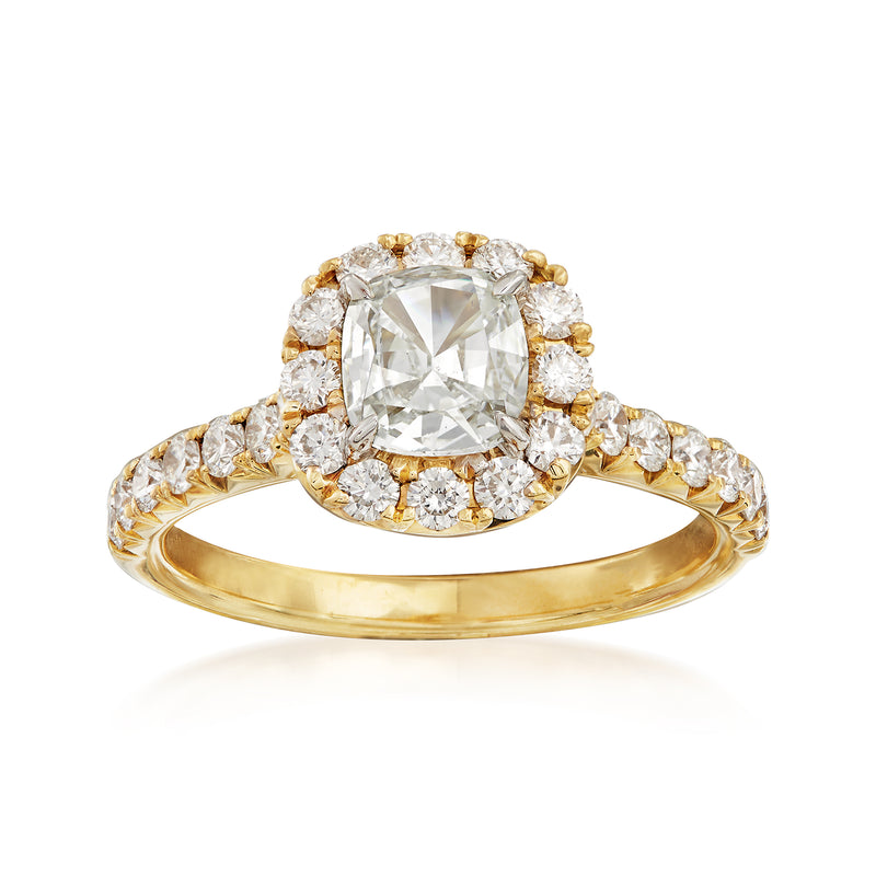 18kt yellow gold diamond engagement ring with cushion-cut center and halo