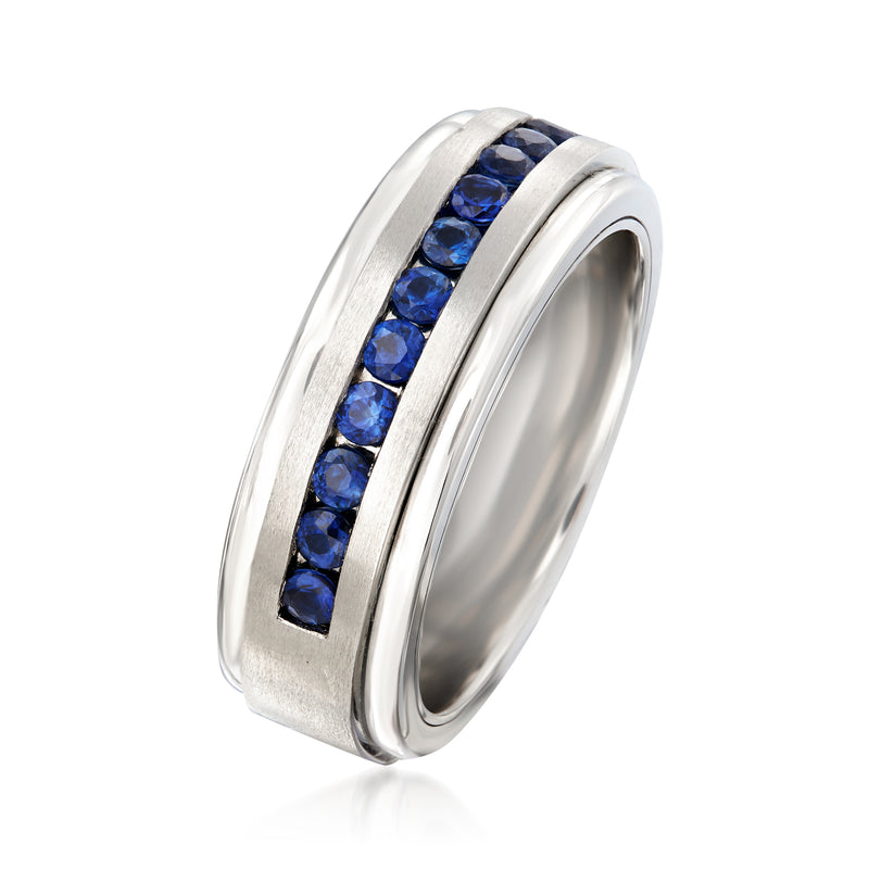 Tungsten carbide wedding band with blue sapphire stones in a channel, side angle