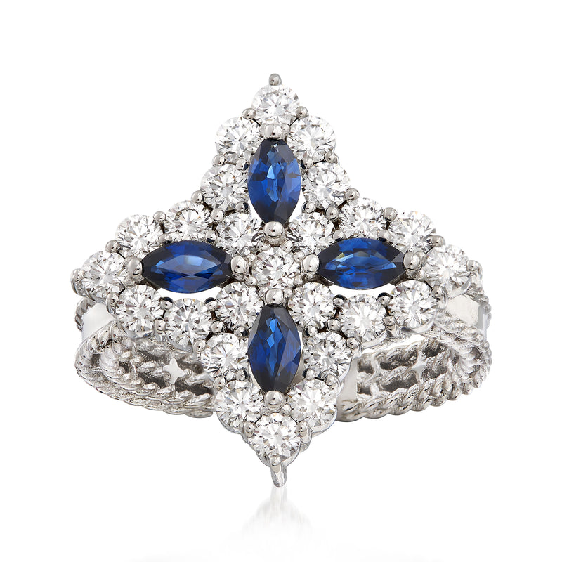 White gold flower ring with blue sapphire center and diamond accents