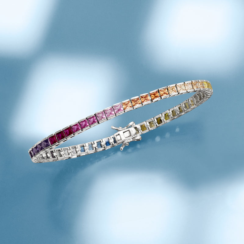 Sterling silver tennis bracelet with multicolor simulated sapphire stones, side view with clasp