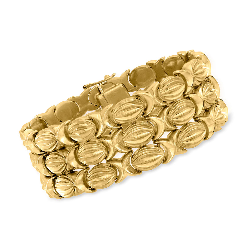 Vintage 18kt yellow gold three-row XO bracelet with oval coin motifs, hinged links