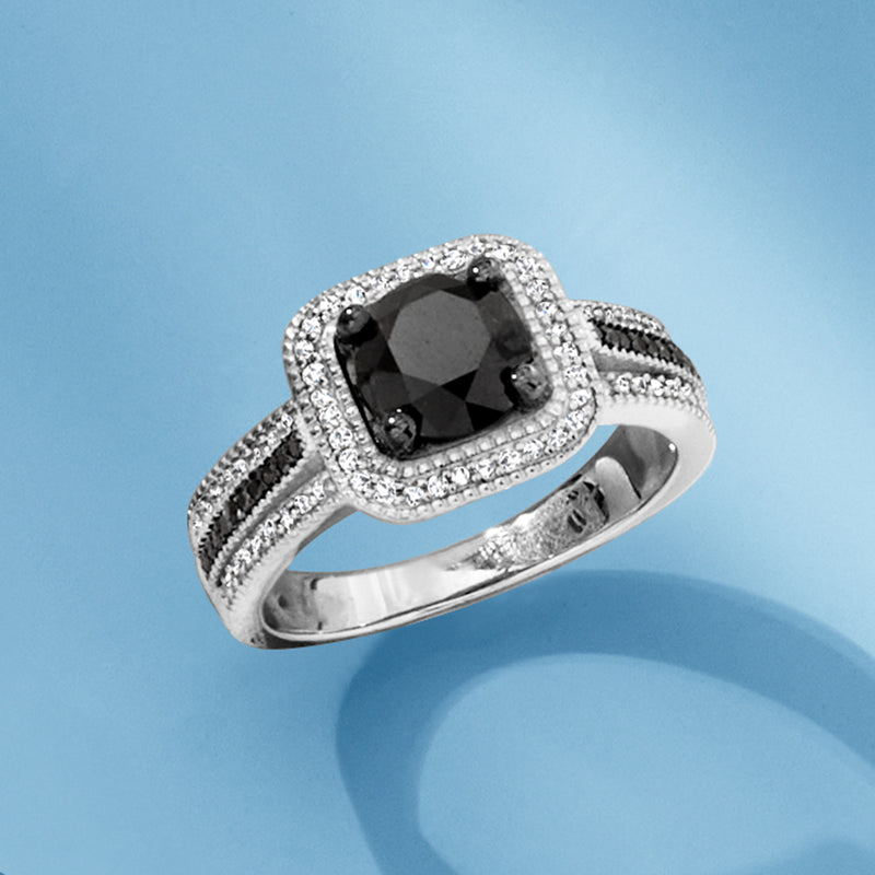 Sterling silver ring with black center diamond and white diamond halo