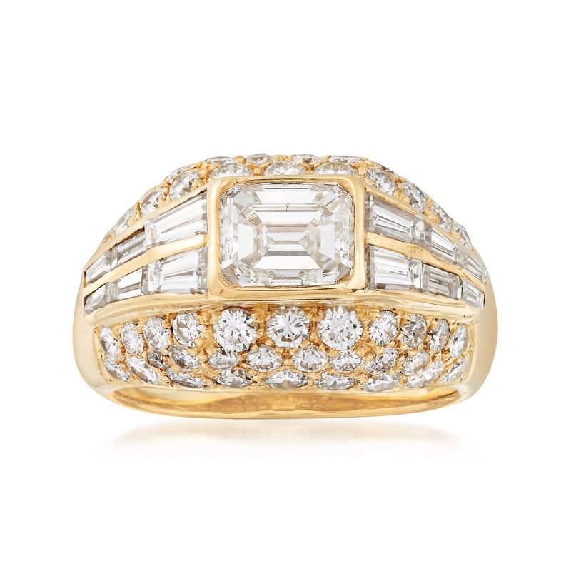 18k yellow gold diamond dome ring with emerald-cut center and baguette accents