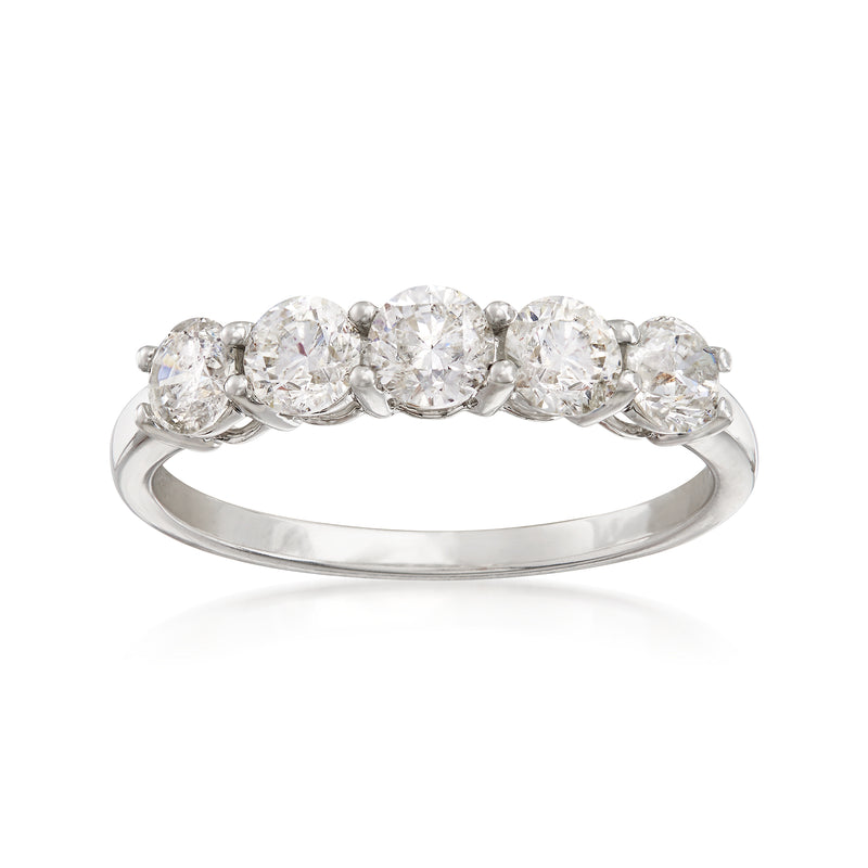 Platinum five-stone diamond ring with five oval-cut stones in a row