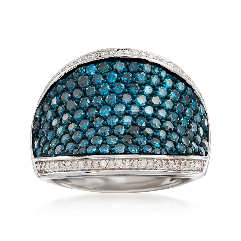 Sterling silver dome ring with blue and clear round stones and a white pave border