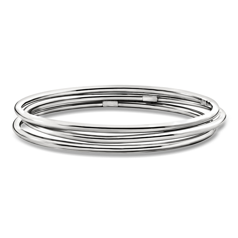 Three polished sterling silver bangle bracelets, stacked round hoops with smooth shine