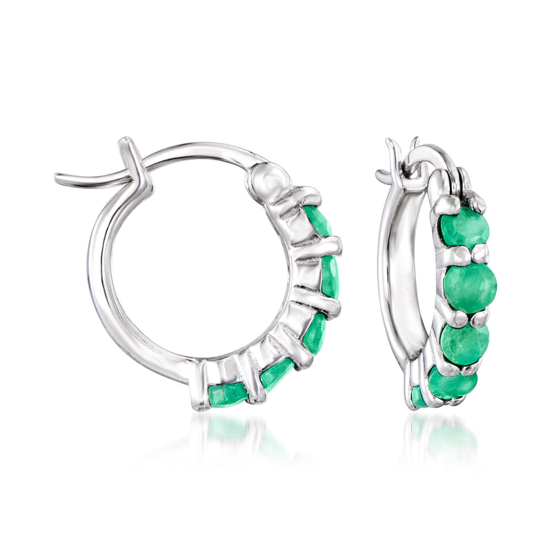 Sterling silver huggie hoop earrings with green stone row, side view