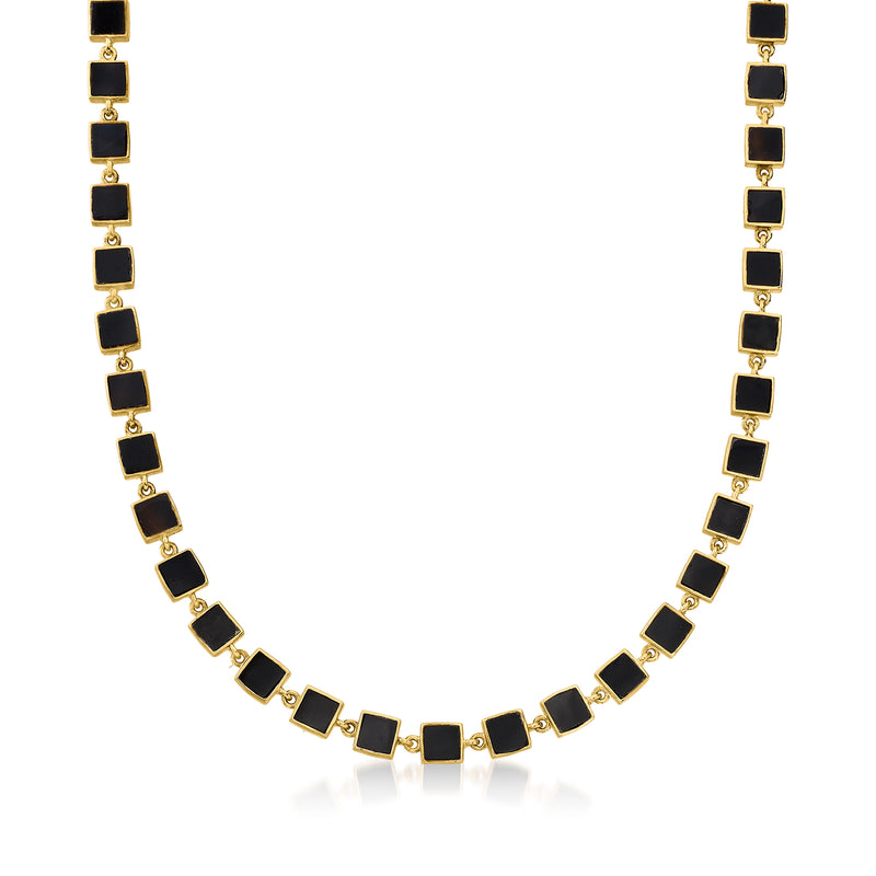 Onyx station necklace with black square bezels and gold links along a chain