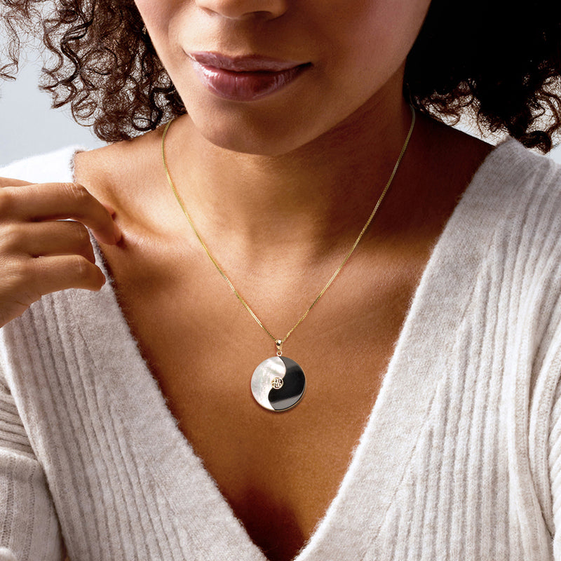 14kt yellow gold yin-yang pendant necklace with mother-of-pearl and black agate
