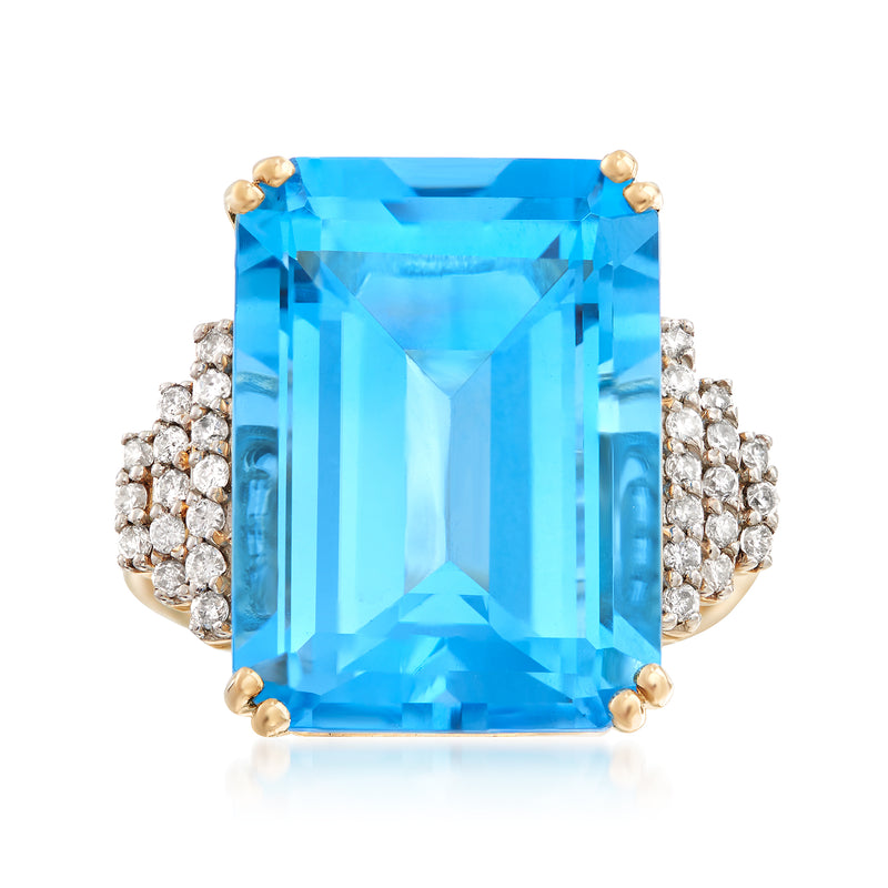14kt yellow gold ring with large square Swiss blue topaz and diamond side clusters