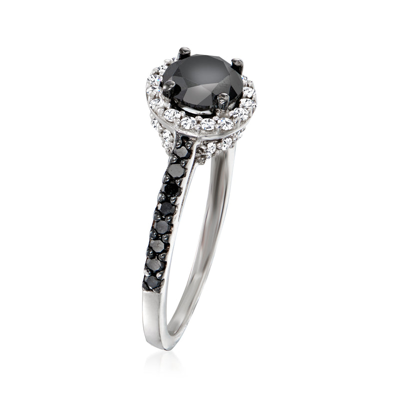Sterling silver ring with black round center, white halo, and dark stones on shank