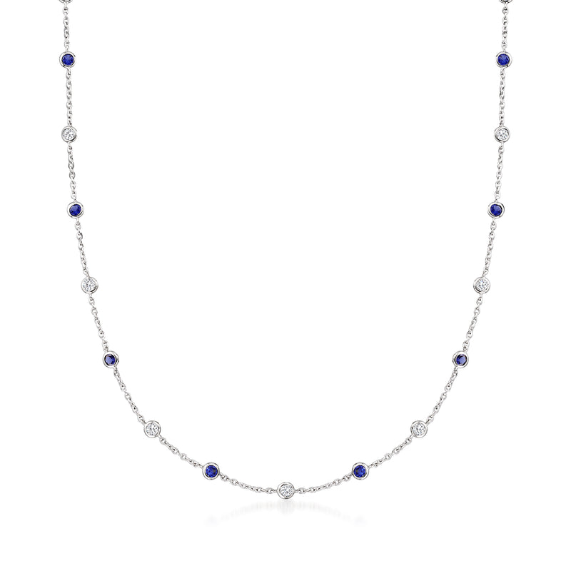 Sterling silver station necklace with blue simulated sapphire and clear CZ round accents