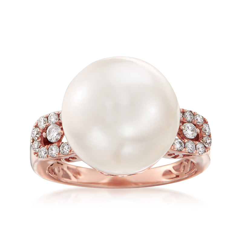 Rose gold ring with large cultured pearl and diamond halo setting, round side stones