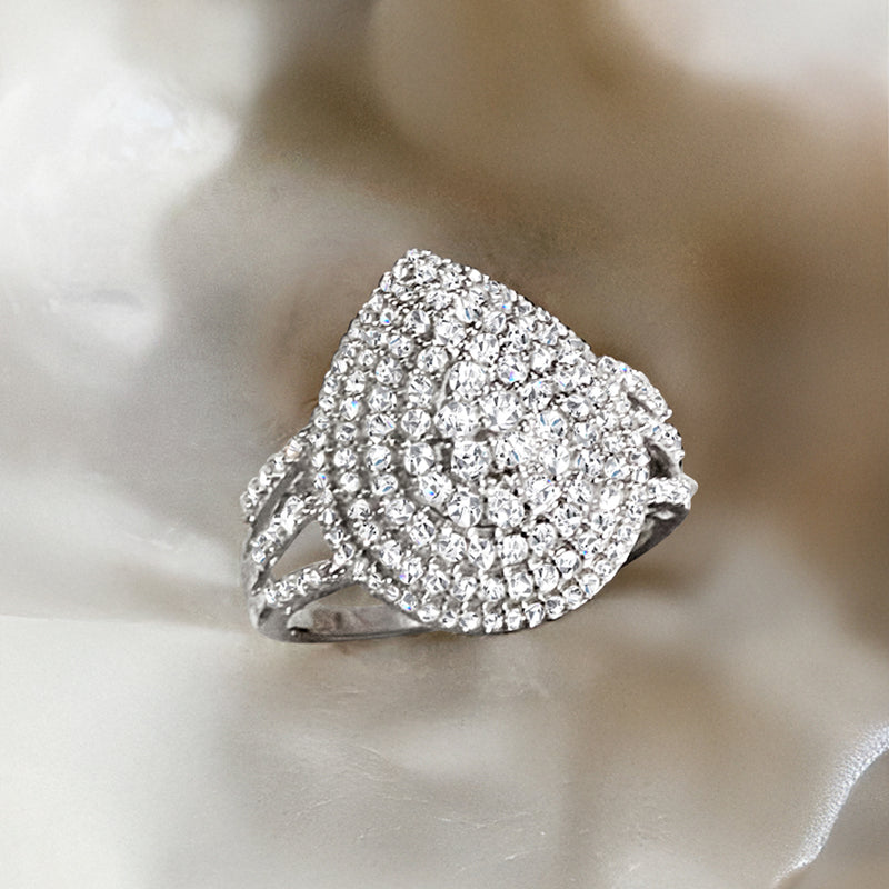 Pear-shaped diamond ring in sterling silver with pavé setting