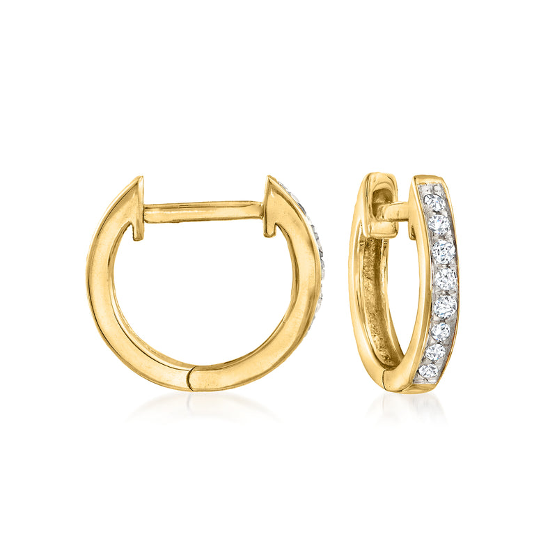 Pair of 14kt yellow gold huggie hoop earrings with diamond front