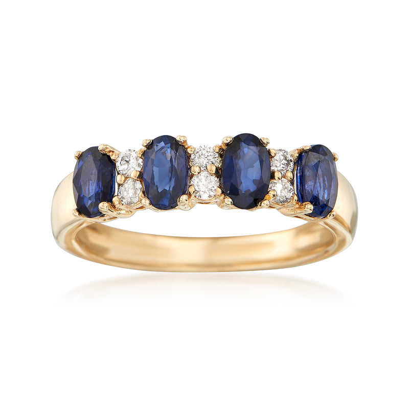 Yellow gold sapphire and diamond ring with three oval deep blue stones