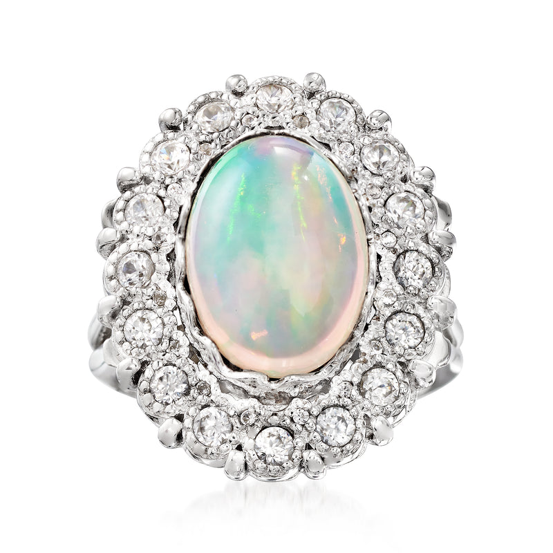Sterling silver opal halo ring with oval opal center and round white zircon accents