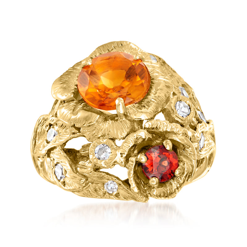 14kt yellow gold ring with oval orange citrine, red garnet, and clear round stones
