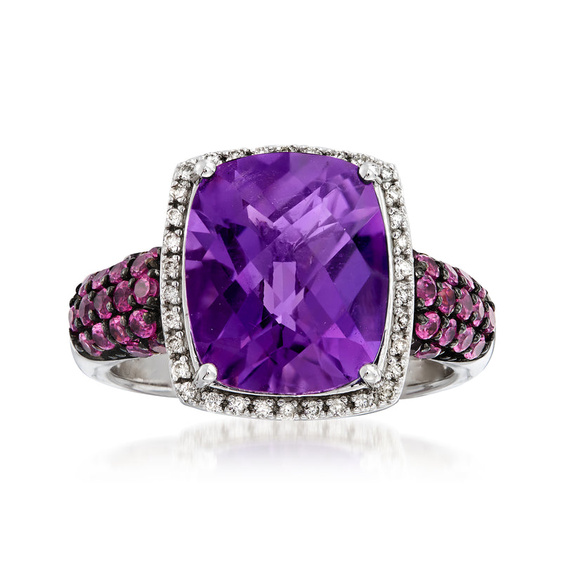 Sterling silver ring with oval amethyst center, rhodolite side stones, diamond halo