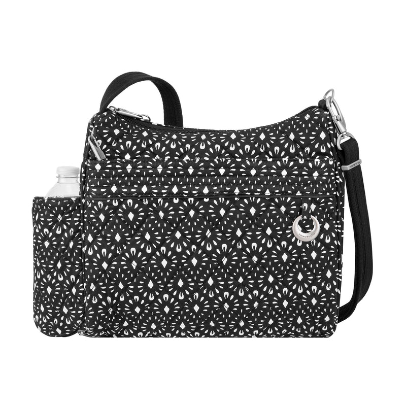 Black square crossbody bag with white geometric print and adjustable crossbody strap