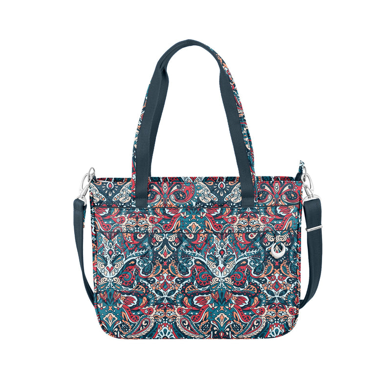 Paisley tote bag with teal, red, and white pattern; dark top handles and side zipper pocket.