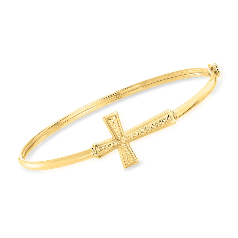 14kt yellow gold bangle bracelet with sideways cross charm
