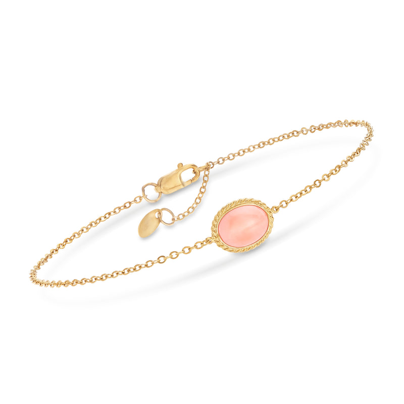 14kt yellow gold chain bracelet with oval pink coral-style gemstone setting