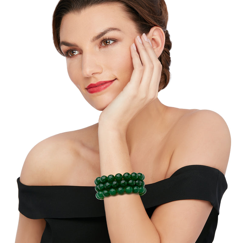 Triple green quartz bead stretch bracelets worn on wrist with round beads