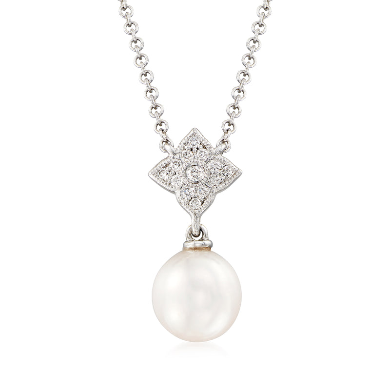Cultured pearl necklace with round pearl drop and diamond-like square clasp in white gold.