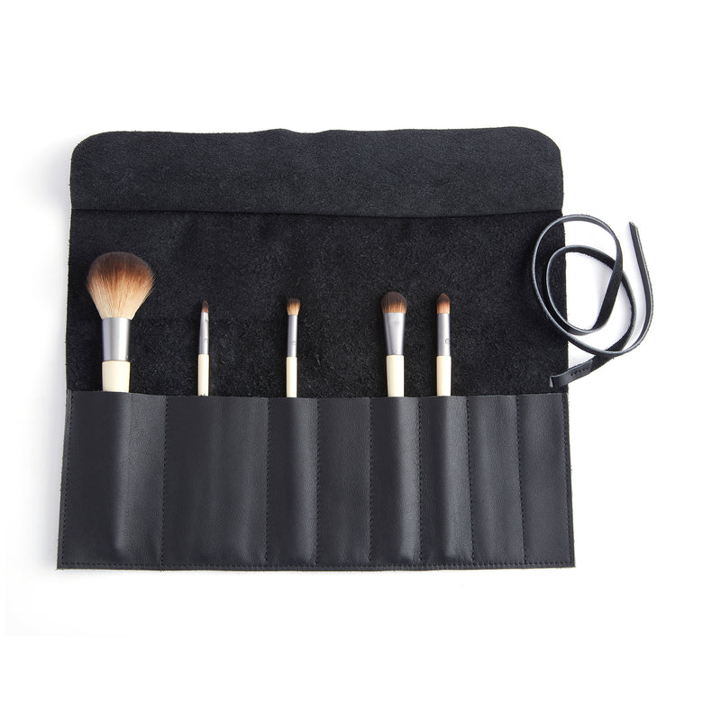 Royce black leather makeup brush roll with five brushes and tie strap
