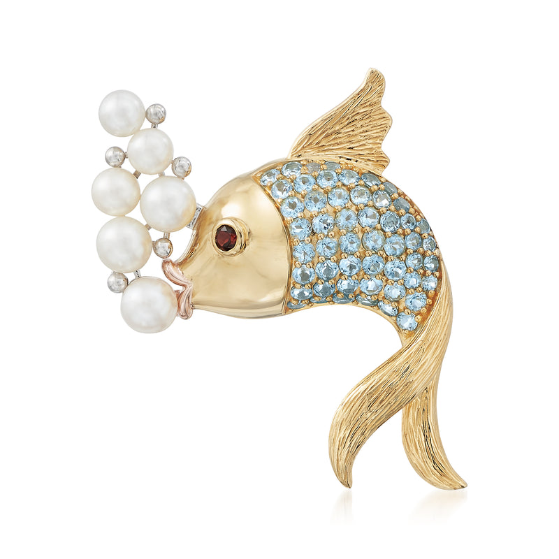 Gold-tone fish pin with blue crystal scales, pearl bubble accents, red eye gem.