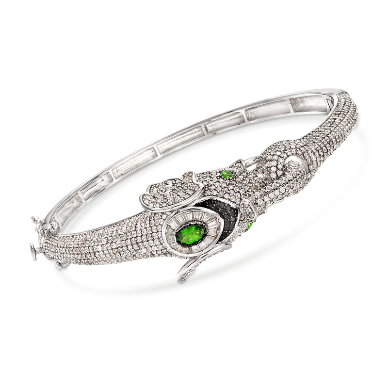 Sterling silver elephant bangle bracelet with pavé stones and green gemstone accents
