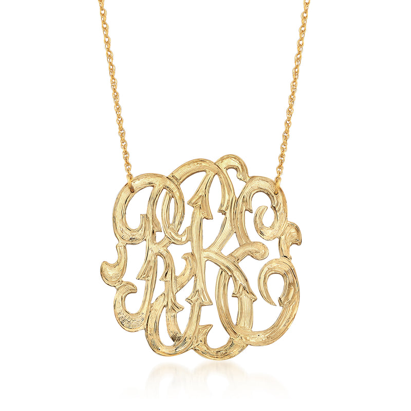 Open script monogram necklace in yellow gold with fine chain and circular pendant