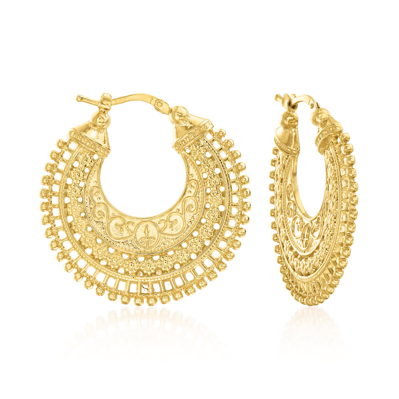 Gold hoop earrings with ornate filigree and beaded outer edge