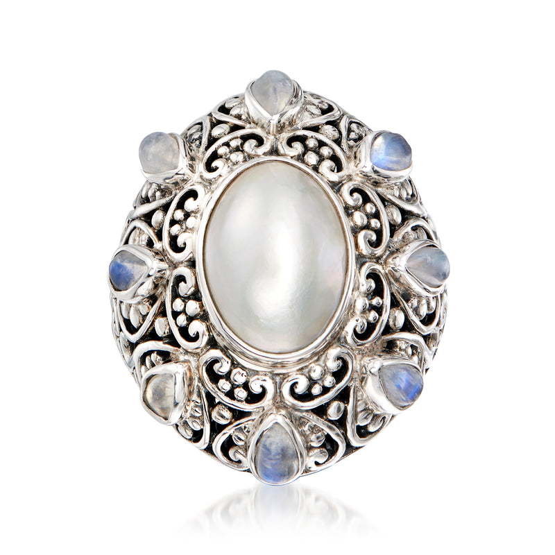 Sterling silver ring with oval cultured mabe pearl center and moonstone cabochons, ornate filigree